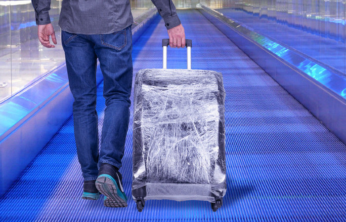 Почему нет смысла обматывать чемодан пленкой во время поездки